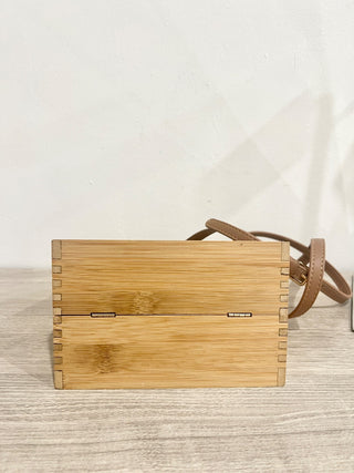 n.a. wooden bag with wood beaded handle