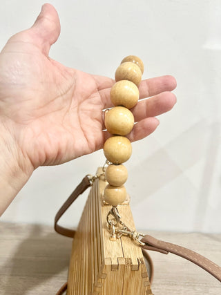 n.a. wooden bag with wood beaded handle