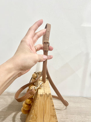 n.a. wooden bag with wood beaded handle