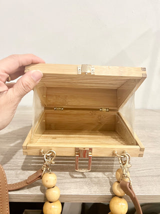n.a. wooden bag with wood beaded handle
