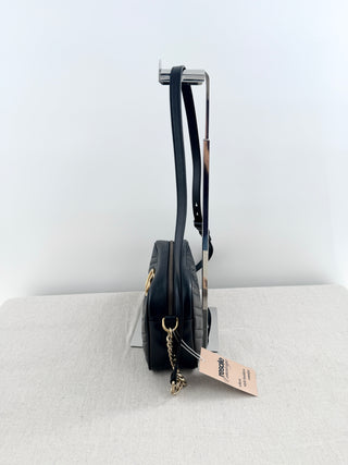 Gucci GG marmont camera bag in matelasse chevron leather with antique gold hardware and chain strap detailing