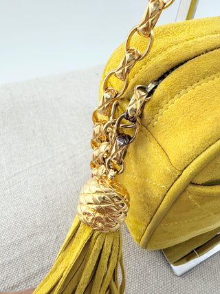 Chanel Quilted suede camera bag with tassel zipper, and gold strap
