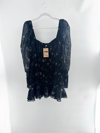 For Love & Lemons Dixon mini dress featuring sheer chiffon overlay with floral print throughout, designed with fully smocked body, sweetheart neckline, sheer puff sleeves, and ruffled hem, M