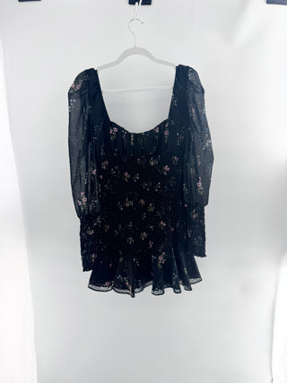For Love & Lemons Dixon mini dress featuring sheer chiffon overlay with floral print throughout, designed with fully smocked body, sweetheart neckline, sheer puff sleeves, and ruffled hem, M