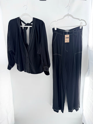 Andres Otalora matching set top and pants, top 6 / bottom 8