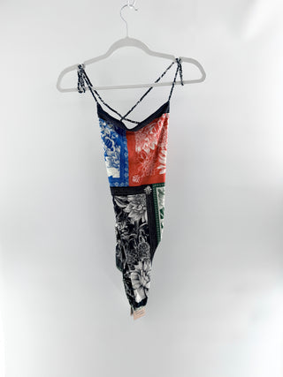 Agua Bendita Kali Wats one-piece swim featuring multicolor patchwork floral print, braided crisscross straps, XL