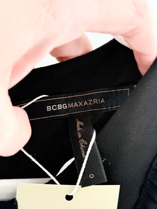 BCBGMaxazria Britt Sleeveless Round Neck Ruffle Trim Mini Dress Black Womens 0