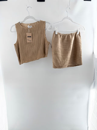 Superdown textured two-piece knit set featuring sleeveless cropped tank top and matching high-waisted mini skirt in soft stretchy fabric with allover wave-textured pleated finish, S