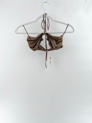 Bec + Bridge ruched cutout crop top featuring delicate tie straps and dramatic gathered detailing, and an open center cutout connected by silver hardware accent, 2