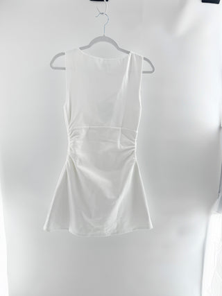 Majorelle sleeveless boat neckline, fitted ruched waist detailing, and softly flared mini skirt in a structured stretch fabric, S