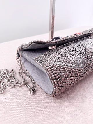 Mary Frances beaded clutch bag with long strap