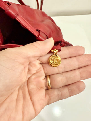 Chanel Red Leather Studded Logo Drawstring Bucket Duffel Bag