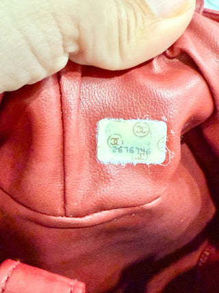 Chanel Red Leather Studded Logo Drawstring Bucket Duffel Bag