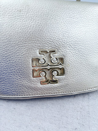 Tory Burch flap metallic leather clutch with logo