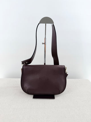 Valentino by Mario Valentino leather flap bag with studded logo and shoulder strap