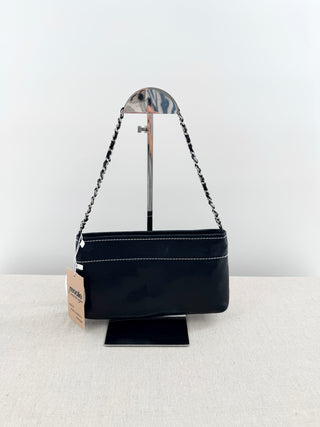 CHANEL vintage leather chain shoulder bag featuring embossed tonal CHANEL logo across front with contrast stitching and leather-threaded chain straps