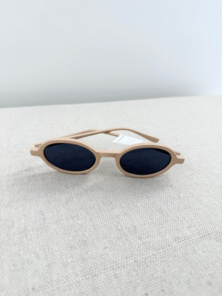 A.J. Morgan oval retro sunglasses featuring slim frame rounded oval silhouette with dark tinted lenses