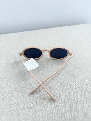 A.J. Morgan oval retro sunglasses featuring slim frame rounded oval silhouette with dark tinted lenses