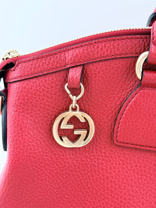 Gucci large leather bag with GG logo and strap
