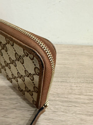 Gucci monogram canvas large zip up wallet