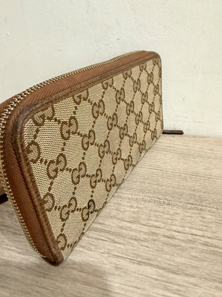 Gucci monogram canvas large zip up wallet