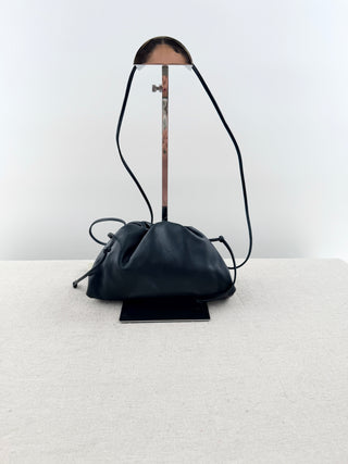 Bottega Veneta small leather clutch bag with strap