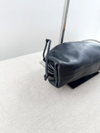 Bottega Veneta small leather clutch bag with strap