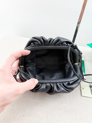 Bottega Veneta small leather clutch bag with strap