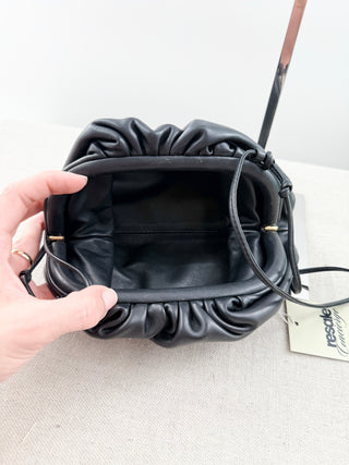 Bottega Veneta small leather clutch bag with strap