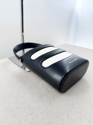 Alexander McQueen bucket leather and canvas bag with chain strap