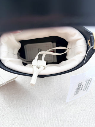 Alexander McQueen bucket leather and canvas bag with chain strap