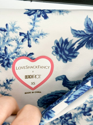 love shack fancy x beach riot activewear set featuring floral toile-print sports bra with cutout detail and signature heart-shaped hardware at center and coordinating high-waisted leggings, XS