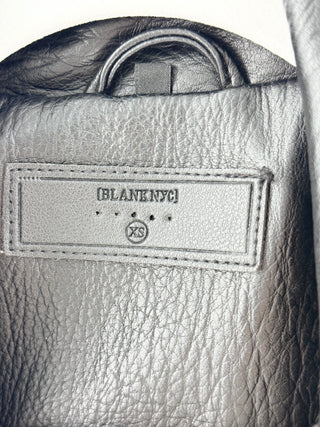 Blank NYC faux leather moto jacket featuring asymmetrical zip-front closure, oversized lapels, zippered pockets, XS