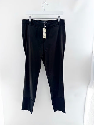 Just Cavalli tailored pants featuring relaxed straight leg, concealed front closure, and oversized turned-up cuff hems, 12