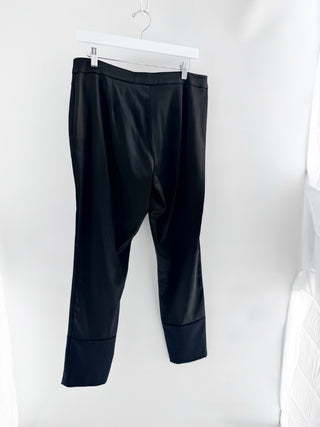 Just Cavalli tailored pants featuring relaxed straight leg, concealed front closure, and oversized turned-up cuff hems, 12
