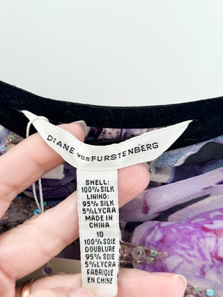 Diane von Furstenberg strapless floral gown featuring cascading ruffle accents, and subtle sequin embellishments, 10