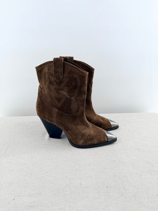 Lola Cruz western-inspired ankle boots crafted in suede featuring classic cowboy stitching, pull tabs, and a stacked block heel, 10