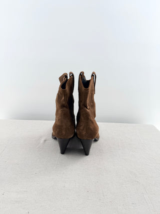 Lola Cruz western-inspired ankle boots crafted in suede featuring classic cowboy stitching, pull tabs, and a stacked block heel, 10