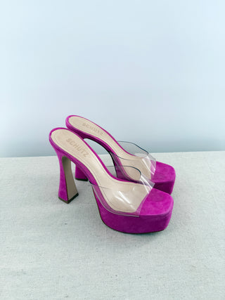 Schutz platform mule heels crafted in suede featuring PVC vamp strap, chunky platform sole, 7.5