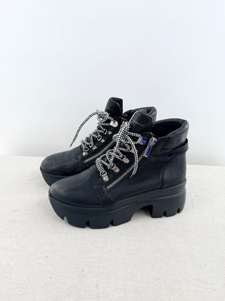 Giuseppe Zanotti Apocalypse Trek hiking boots crafted in pebbled leather with chunky lug soles, oversized side zippers, and statement platform sole, 39