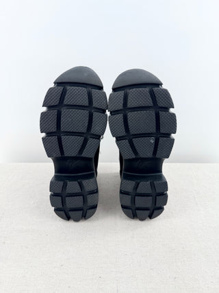 Giuseppe Zanotti Apocalypse Trek hiking boots crafted in pebbled leather with chunky lug soles, oversized side zippers, and statement platform sole, 39