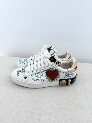 Dolce and Gabbana portofino sneakers crafted in leather with graffiti-inspired design, handwritten motifs, finished with decorative embellishments at heel, 39.5