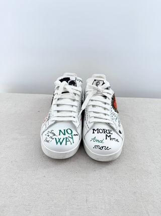 Dolce and Gabbana portofino sneakers crafted in leather with graffiti-inspired design, handwritten motifs, finished with decorative embellishments at heel, 39.5