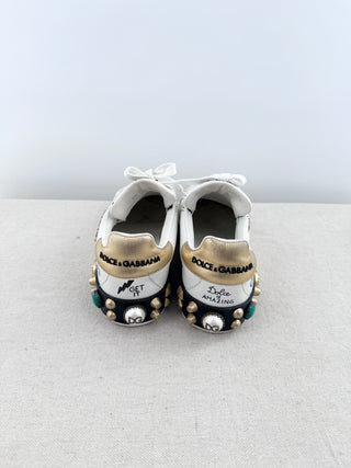 Dolce and Gabbana portofino sneakers crafted in leather with graffiti-inspired design, handwritten motifs, finished with decorative embellishments at heel, 39.5