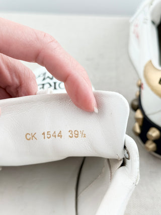 Dolce and Gabbana portofino sneakers crafted in leather with graffiti-inspired design, handwritten motifs, finished with decorative embellishments at heel, 39.5