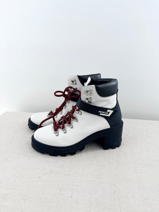 Moncler Blanche ankle boots crafted in grained leather with chunky lug soles, block heel, and logo-detailed ankle strap, 39.5