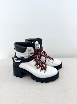 Moncler Blanche ankle boots crafted in grained leather with chunky lug soles, block heel, and logo-detailed ankle strap, 39.5