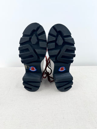 Moncler Blanche ankle boots crafted in grained leather with chunky lug soles, block heel, and logo-detailed ankle strap, 39.5