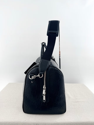 Gucci leather GG embossed jumbo duffle bag with strap