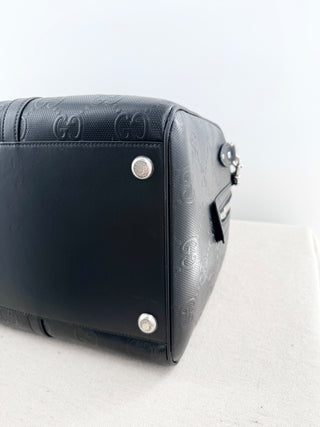 Gucci leather GG embossed jumbo duffle bag with strap
